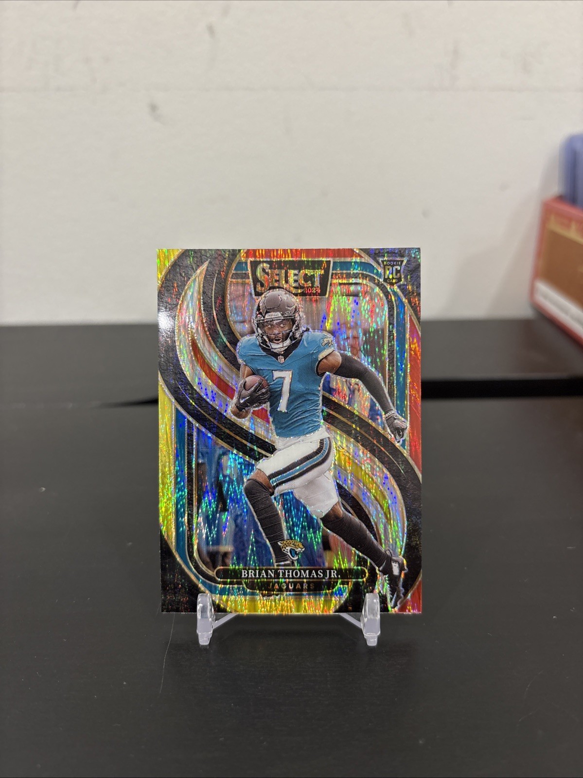 2024 Select Brian Thomas Jr. Premier RC Red and Yellow Prizm Shock #143 Jaguars