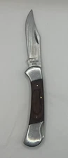 VINTAGE STAINLESS STEEL KNIFE WITH WOOD COVER"7.5" INC