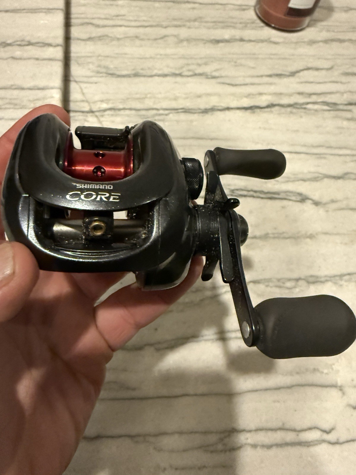 Shimano Core 101Mg Baitcast  6.2:1 Gear Ratio Metal Black Red Left Handed