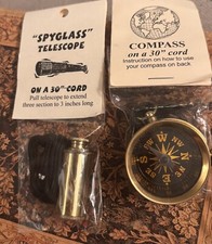 Spyglass telescope and Compass on cord
