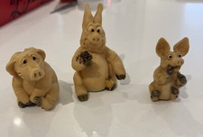 Three Vintage Pigs