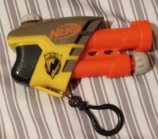 NERF Secret Strike Pocket Sized blaster 11145 With Yellow Foam Dart