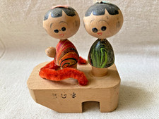 Mini Hand Painted Wood Dolls Riding Zori. . 3" L X 1.75"W X 3.5 "HT. Japan