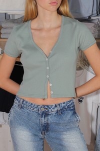 green ruffle top