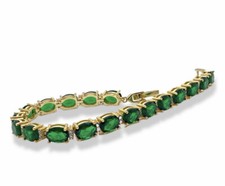 Yellow gold finish oval Green emerald and created diamonds tennis bracelet 