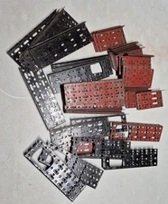 Mix of 62 Q, P, R and CE A.C. Gilbert Erector Set Base Plates