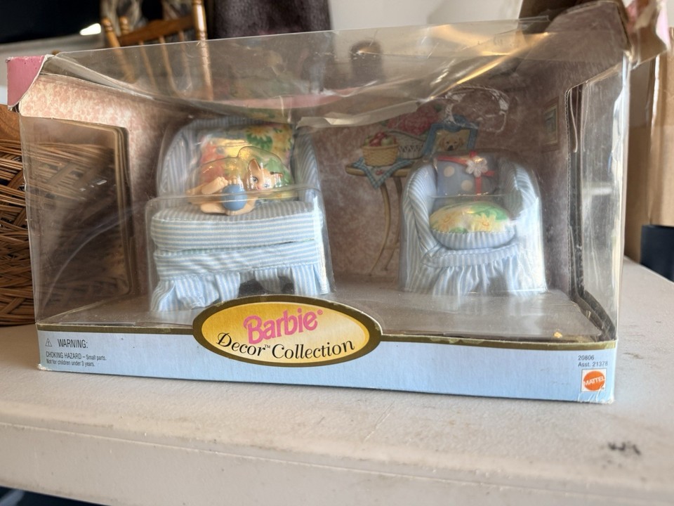 A pair of genuine vintage Barbie-branded miniature living room chairs — actual collectible dollhouse furniture with serious retro camp appeal.