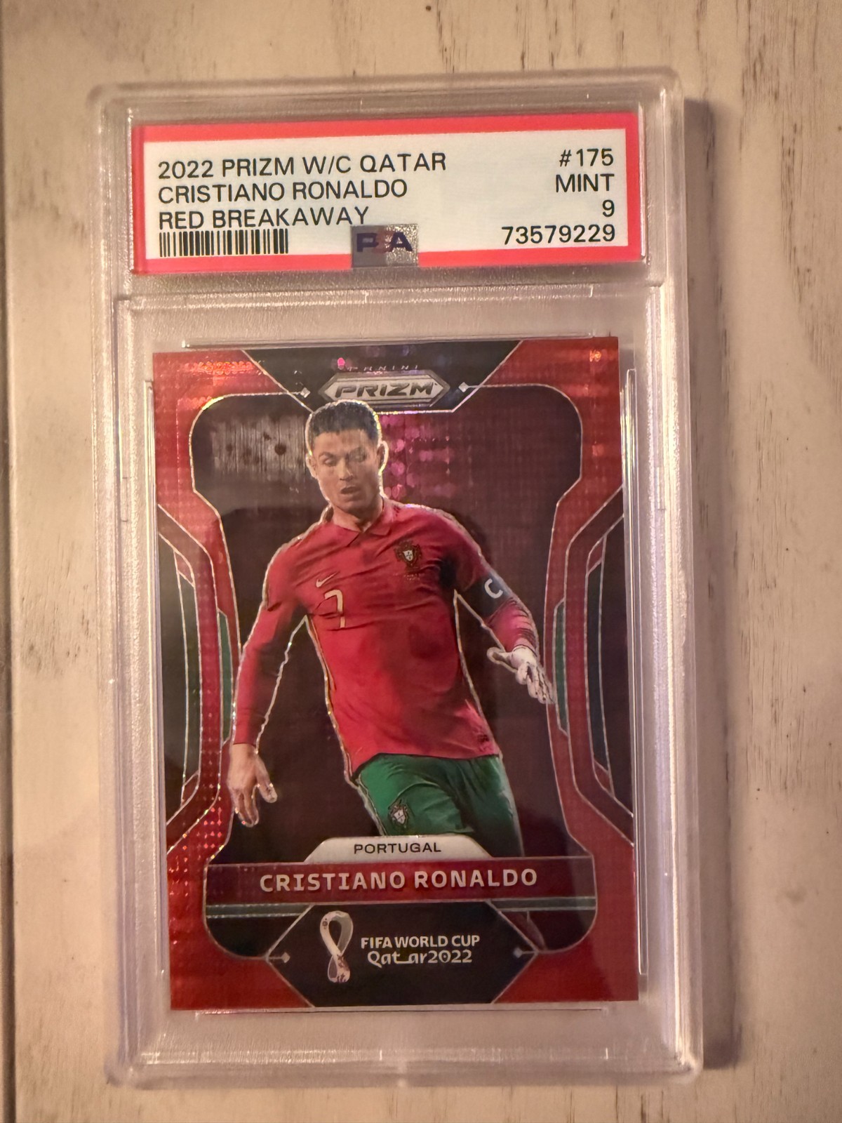2022 PRIZM W/C QATAR #175 CRISTIANO RONALDO RED BREAKAWAY 50/99 PSA 9