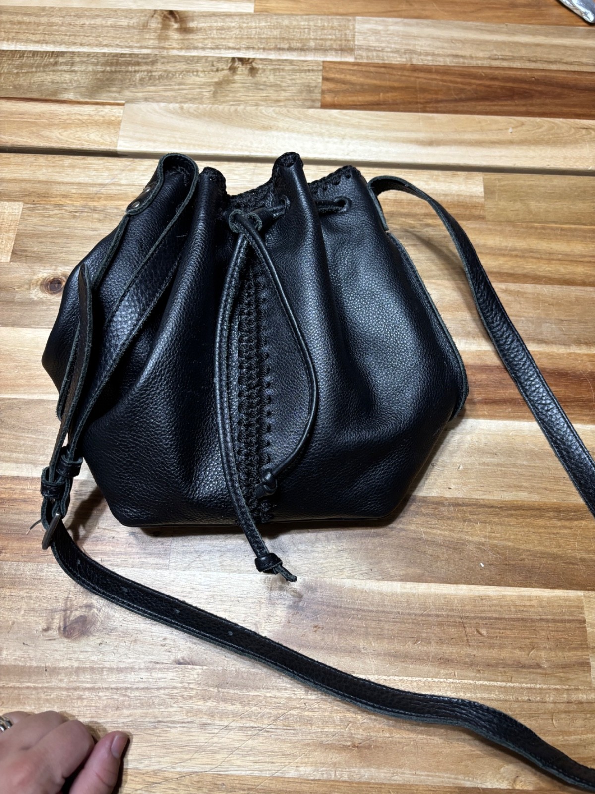 The Sak Black Pebbled Leather Drawstring Bucket Bag Adjustable Crossbody