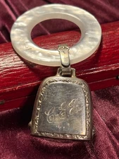 Vintage mother of pearl and sterling silver baby teether and rattle