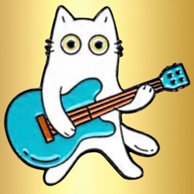 Musical cat with big eyes happily plays blue guitar.  Pin, brooch.