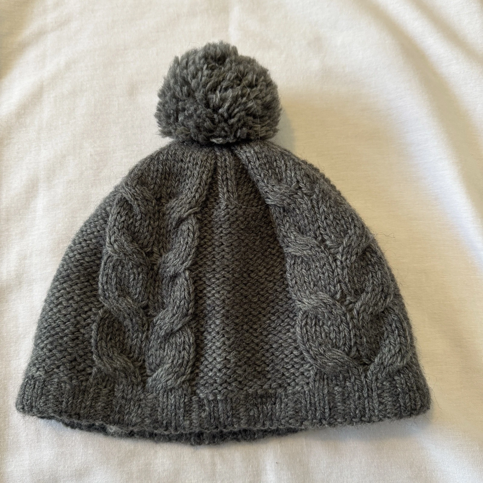 outdoor-research windstopper winter hat pom pom wool blend lined 