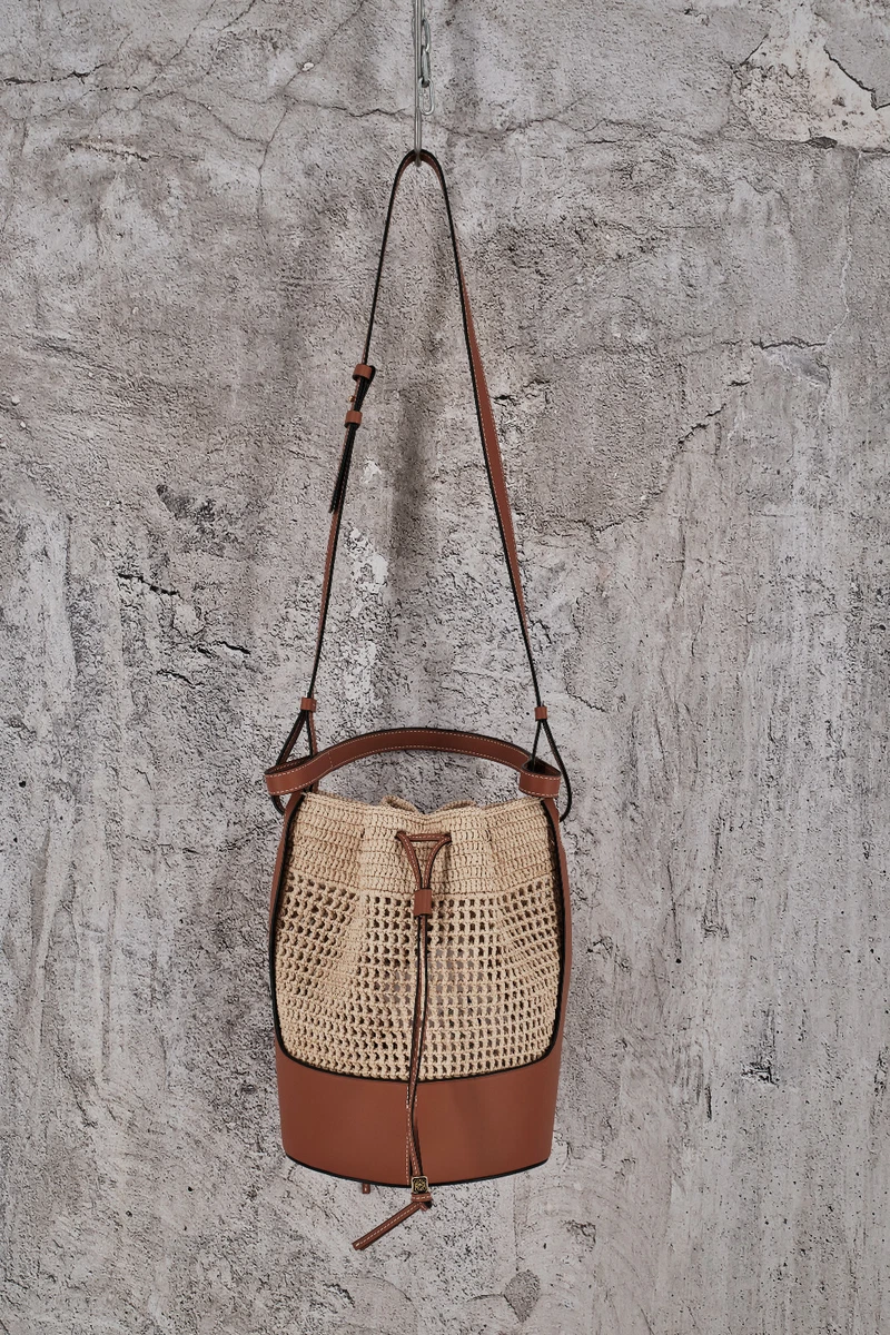 Shop LOEWE LOEWE x Paula's Ibiza Raffia & Leather Bucket Bag