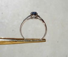 Solitario de diamantes negros de oro blanco de 10 k de 0,55 quilates con detalles de diamantes talla 7