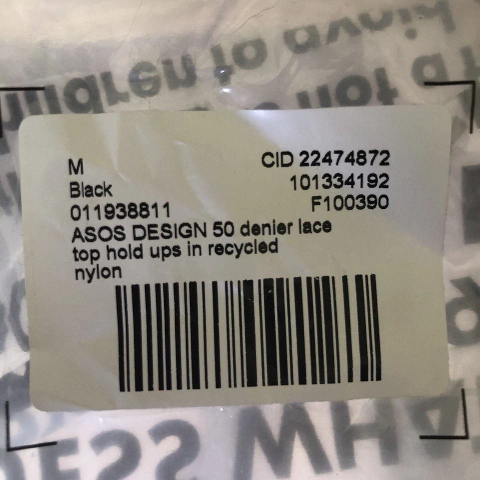 Medias de sujeción de encaje negras talla mediana de Asos Foto 3 de 4