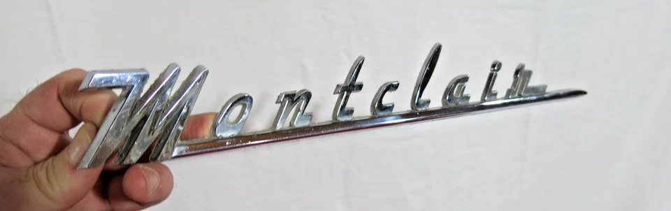 1955 1956 Mercury Montclair escritura emblema placa de identificación cursiva BV-01698-A 25579 OEM Foto 2 de 4