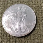 U.S. Mint American Eagle 2001 1 oz .999 Fine Silver Coin with Capsule.