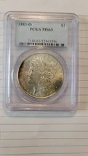 1883 O Morgan Silver DOLLAR PCGS MS 63 With ..... CRESENT  Shaped TONING