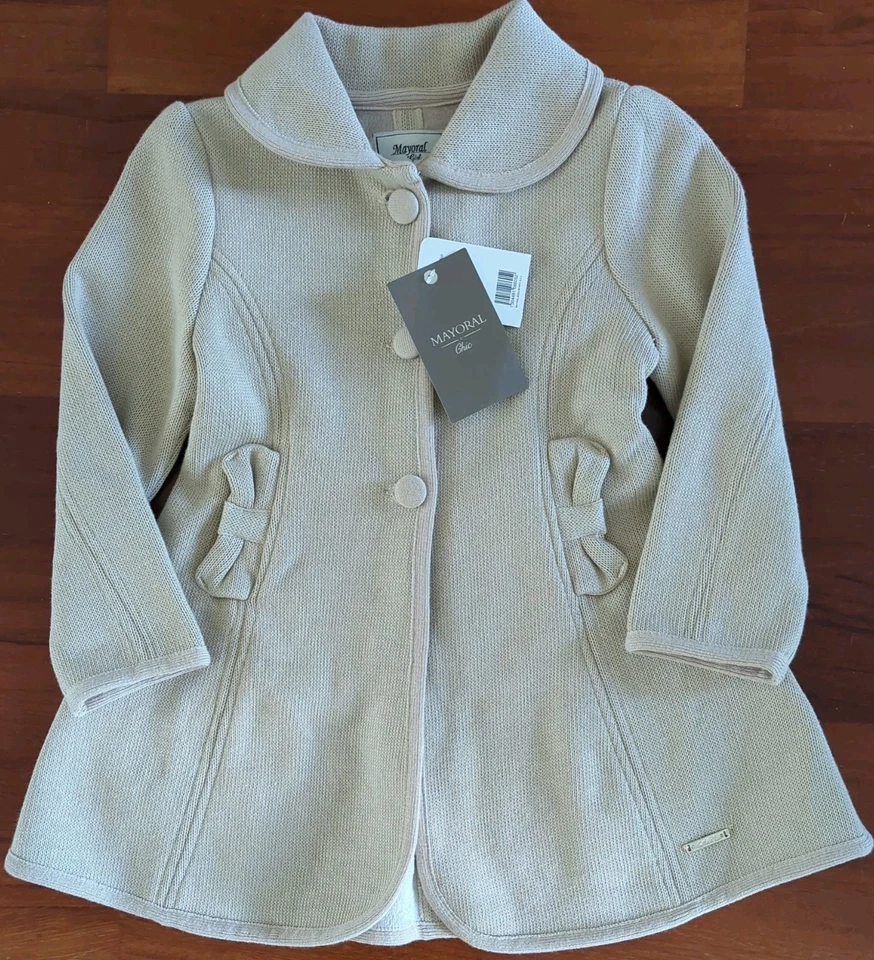 Abrigo Mayoral Chic Niñas Tejido Guisante Beige Talla 5. Bolsillos con botones de punto forrados de vellón Foto 2 de 4