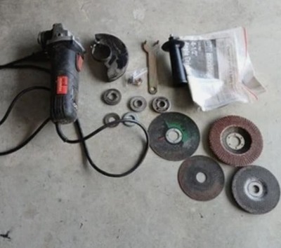 Drill Master Corded 120v 4-1/2'' Angle Grinder with accessories Used