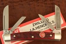 JA HENCKELS  SOLINGEN GERMANY RED BONE PREMIUM CONGRESS KNIFE NICE (27815)