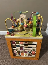 B. toys Zany Zoo Wooden Activity Cube Very Heavy solid Wood 17 In X 12 In