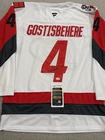 JSA COA SHAYNE GOSTISBEHERE Signed Autographed Carolina Hurricanes Hockey Jersey