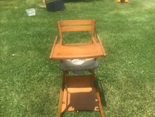 Antique wooden potty high chair folds into stroller or play desk