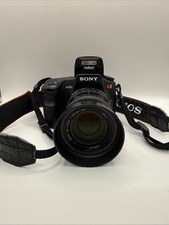 Sony Alpha 200 DSLR camera with a Minolta zoom lens