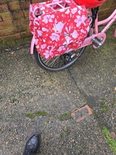 Gorgeous girls/ladies pink sity bike with whicker basket & set of panniers.