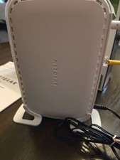 Netgear Super-G Wireless Router previously owned-Has box with Cords and Manual
