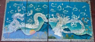 Vintage Chinese four panel lacquer art piece featuring mother of pearl inlay.