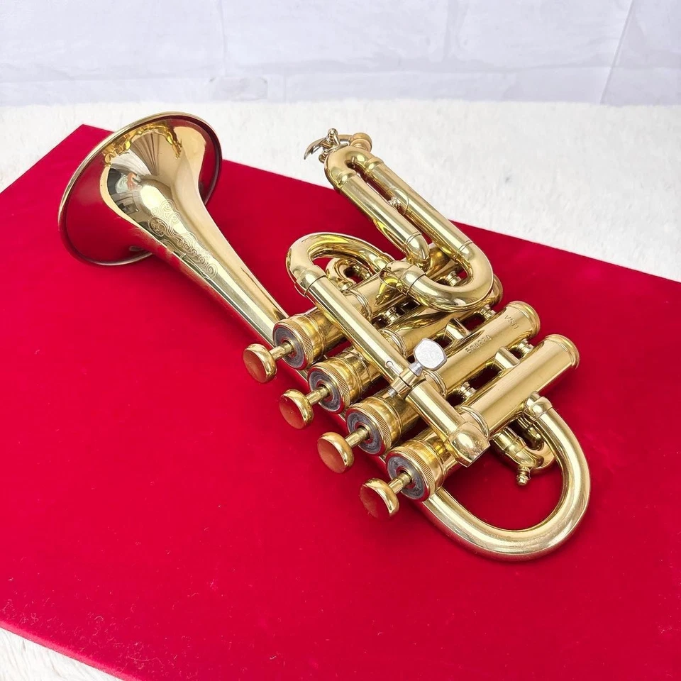 Trompeta Benge Piccoro Bb/A laca dorada usada con estuche rígido Foto 2 de 4