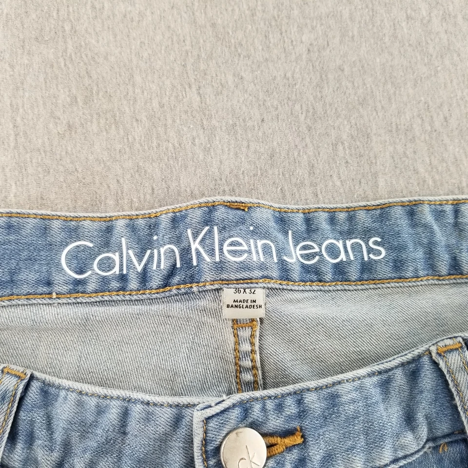 Pantalones de mezclilla Calvin Klein para hombre talla 36x32 azul lavado medio ajustados rectos rotos cómodos Foto 3 de 4