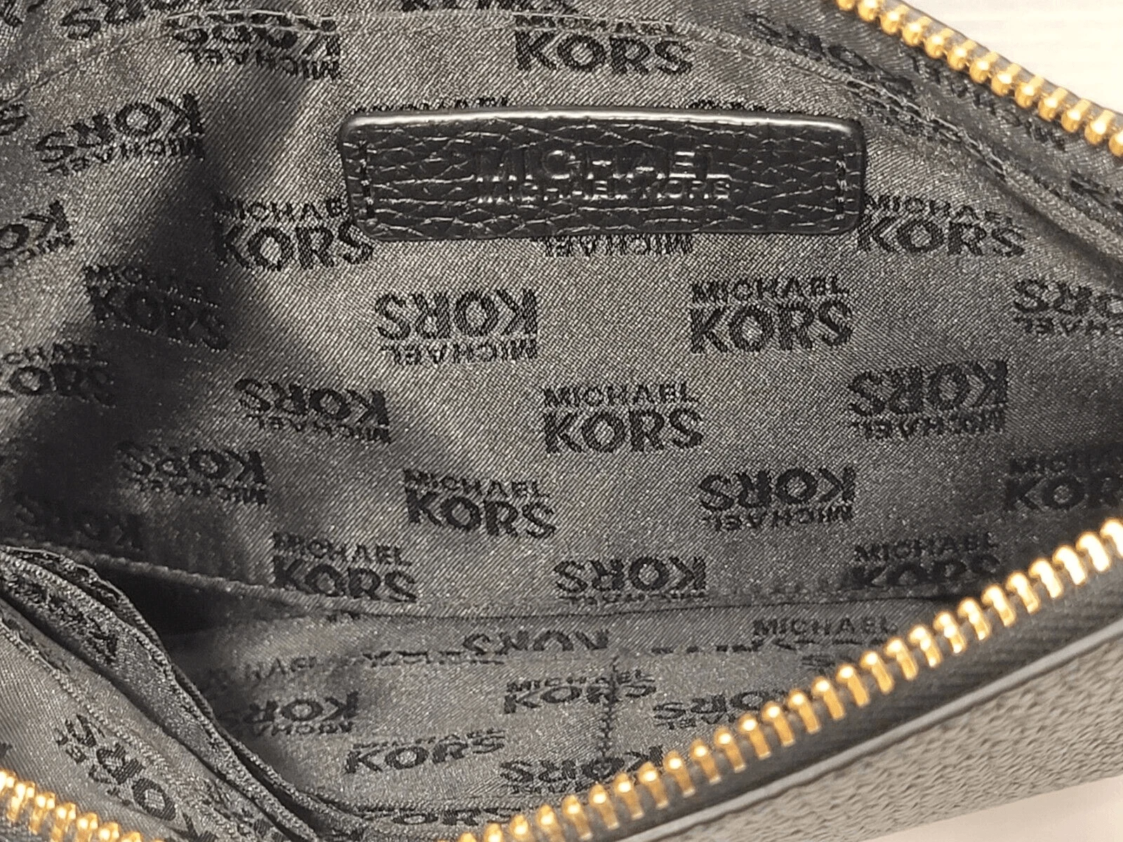 MICHAEL Portafoglio da polso Michael Kors MK Fulton in pelle con cerniera oro nero