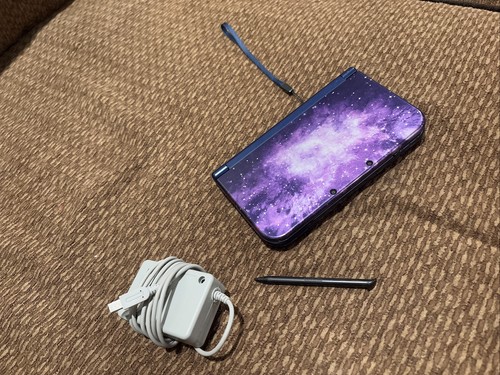 nintendo 3ds xl galaxy edition leicht gebraucht ohne Karton keine Kratzer oder Schrammen + Hülle