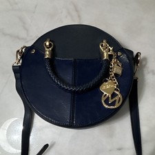 MKF Women s Small Blue Round Crossbody Bag Zi...