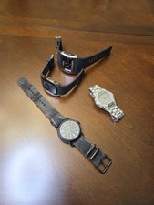 4 Misc Quartz Watches.  OHSEN,  Casio Databank Analog/digital,  Nixon & Other