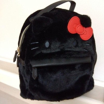black hello kitty backpack with red bow Small 12 inch Bows Backpack LA This white faux leather backpack features a Hello Kitty face with whiskers and a 3D signature bow Fast Forward Hello Kitty Black