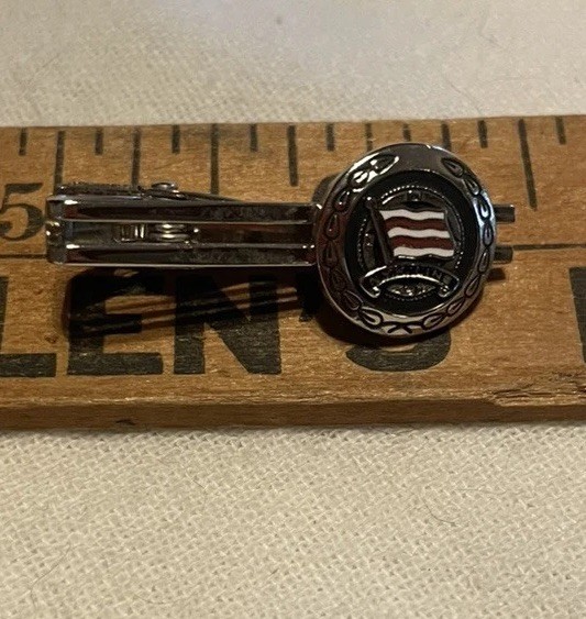 Vintage N.Y.K. Line embossed flag badge on a tie pin/clip-Maritime advertising