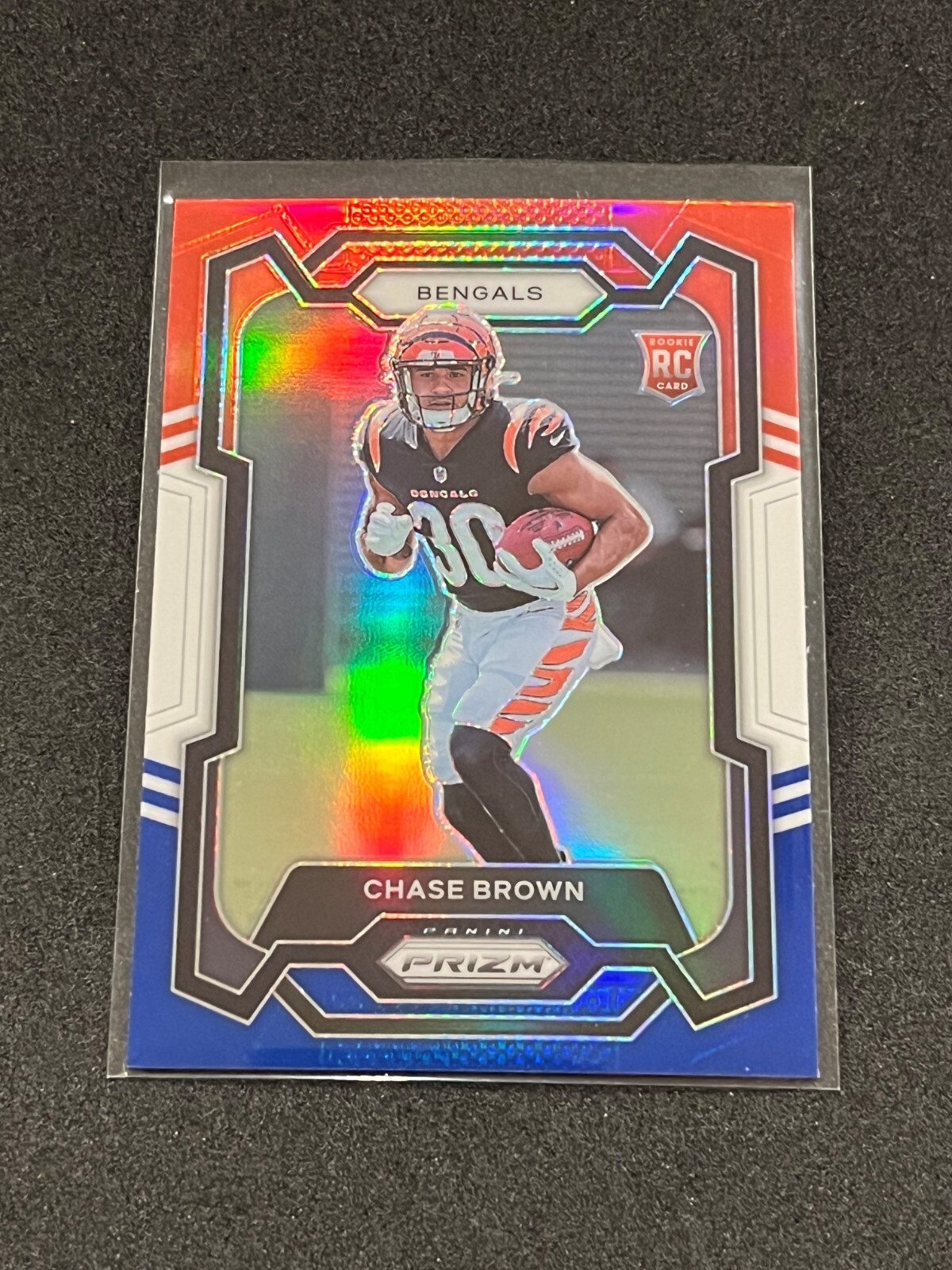 2023 Panini Prizm Football Chase Brown Red/White/Blue Prizm Rookie #318 Bengals