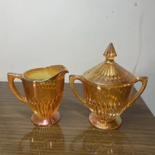 Vintage Jeanette Iridescent Carnival Glass Marigold Creamer and Sugar Bowl.