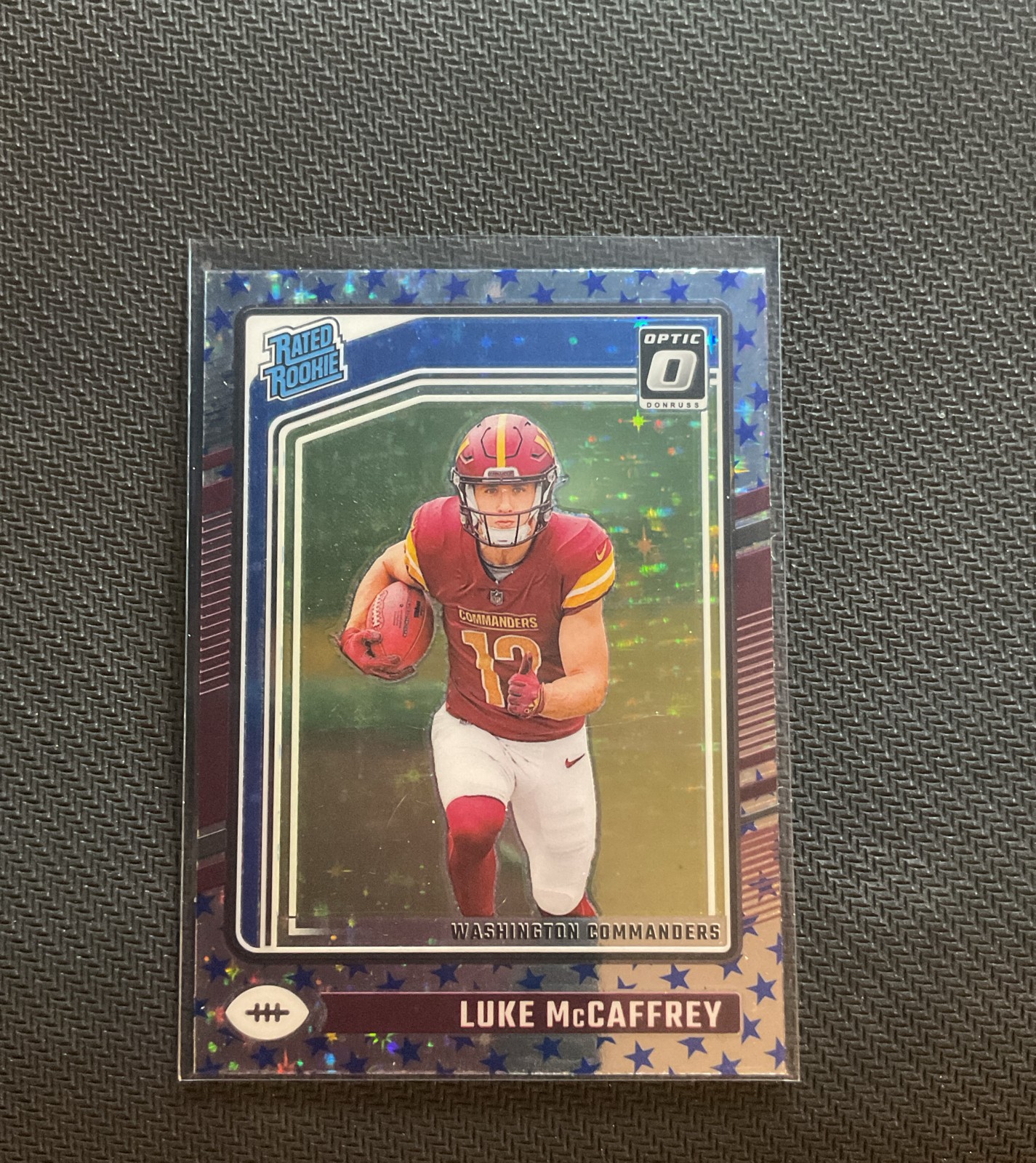 2024 Panini Donruss Optic - Rated Rookie Luke McCaffrey #268 Stars Prizm (RC)