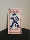 Vintage Cracker Jack Porcelain Enamel Sign  The More You Eat - The More You Want