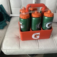  6 32 Oz Gatorade    Water Bottles And Lightning Holder.