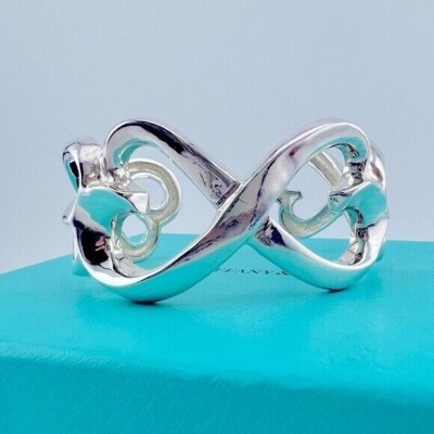 Tiffany & Co. Paloma Picasso Sterling Silver Loving Hearts Bangle