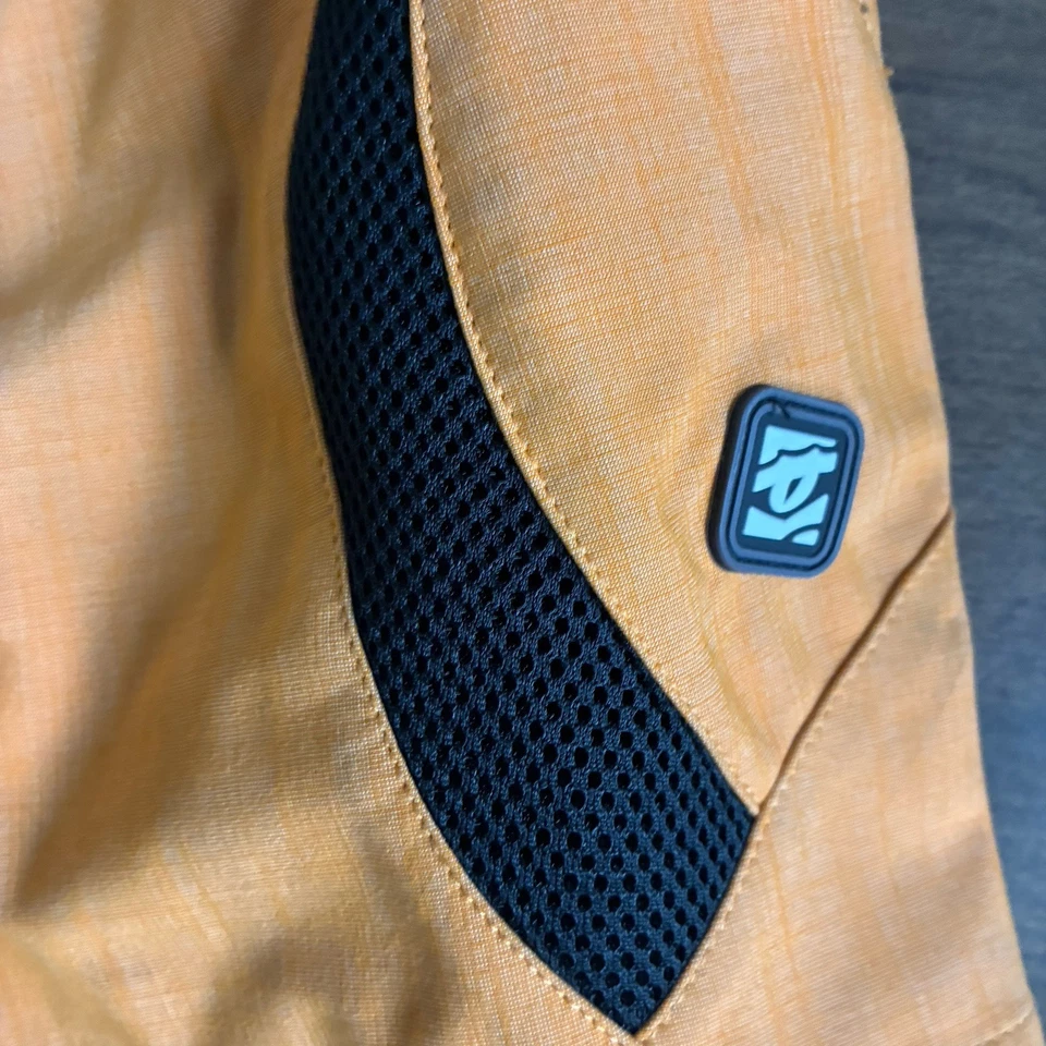 Pantalones cortos de ciclismo Race Face Ambush naranja talla grande para hombre Foto 3 de 4