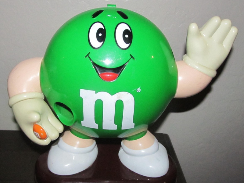 Vintage 1992 Smiling & Waving Green M&M Candy Dispenser - The Mars Corporation