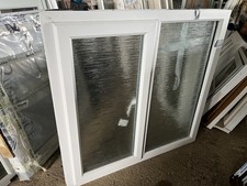 Image of UPVC Window Two Pane 120 W x 114 H x 7 D , frosted glass, one opening window.