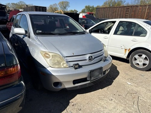 2005 Scion Xa Bumper and Grille 1E7 Silver Metallic 1E7 With Lights